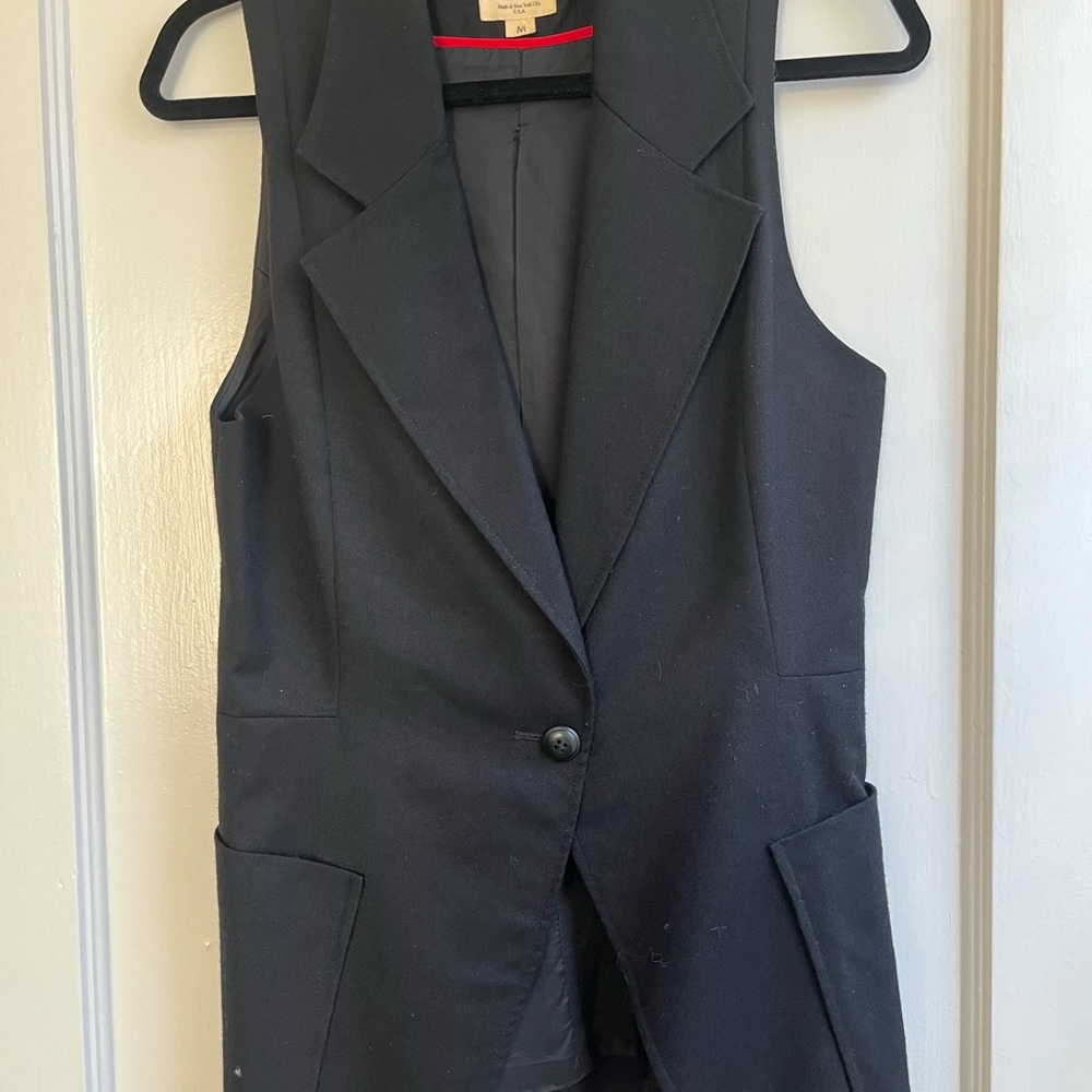 Black waist coat. Size M